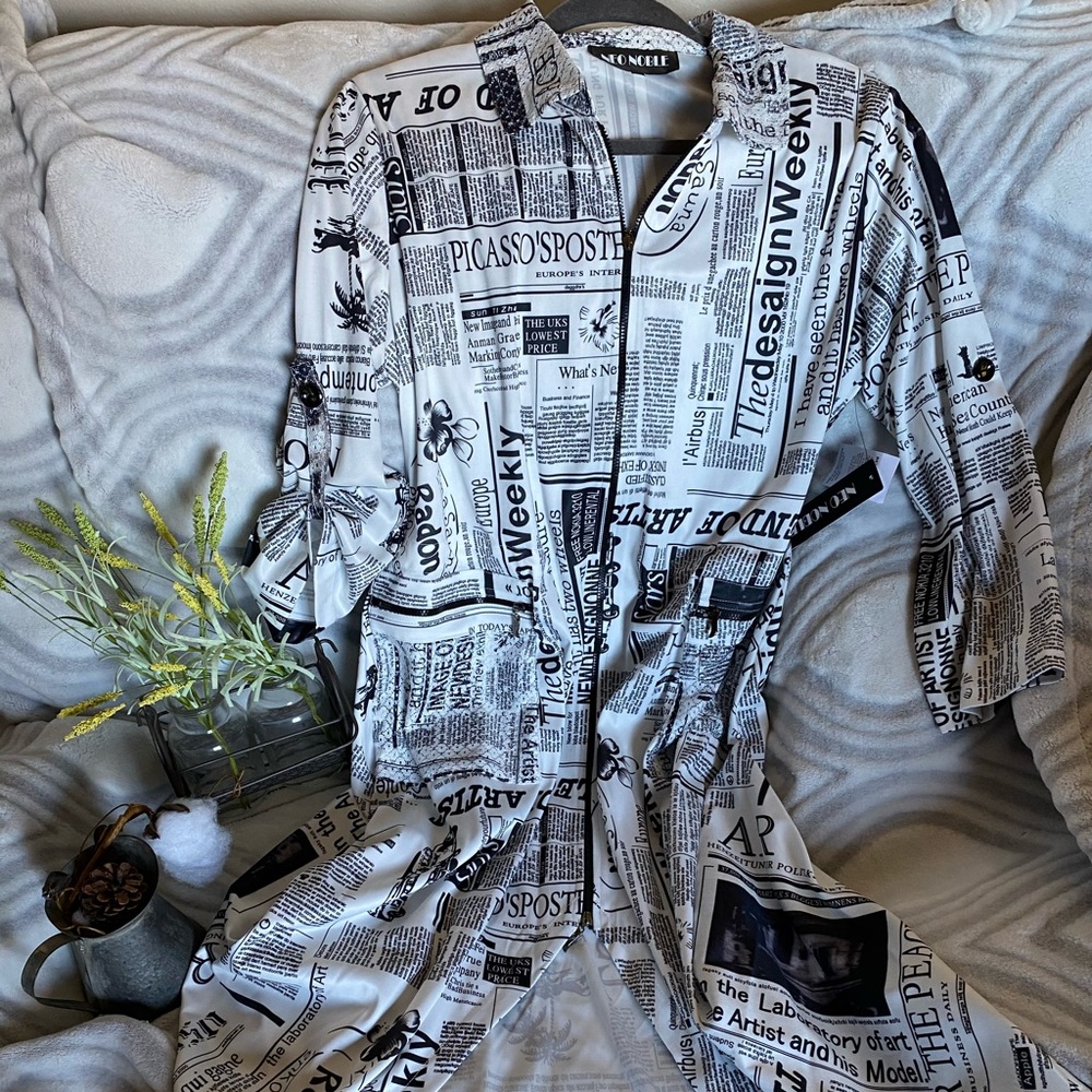 Zip-up 3/4 length, newspaper print fashion sweater